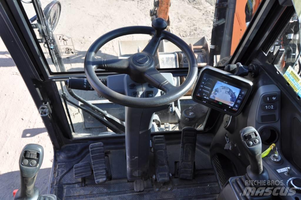 Doosan DX 100-7 حفارات بعجل