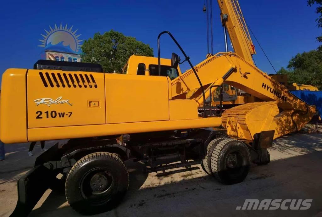 Hyundai R210W-7 حفارات بعجل