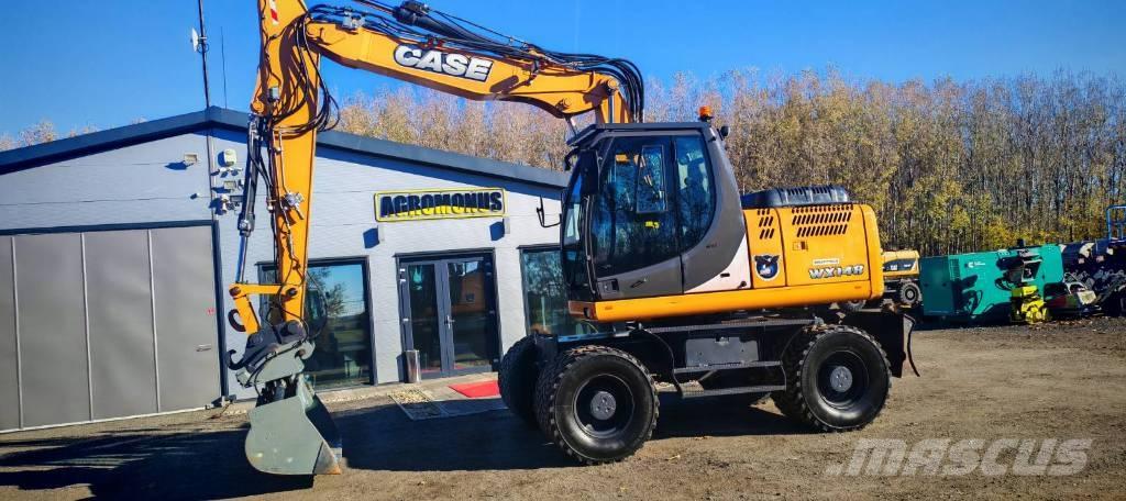 CASE WX 148 حفارات بعجل