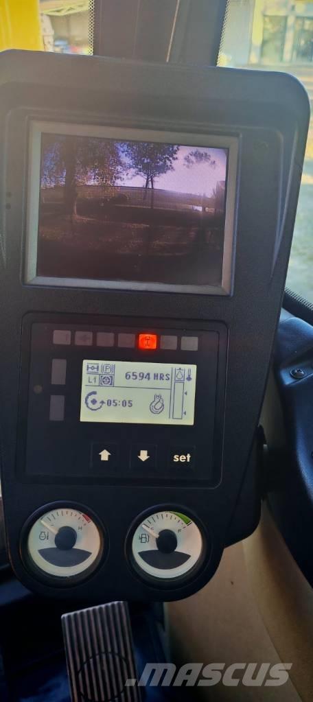 CASE WX 148 حفارات بعجل