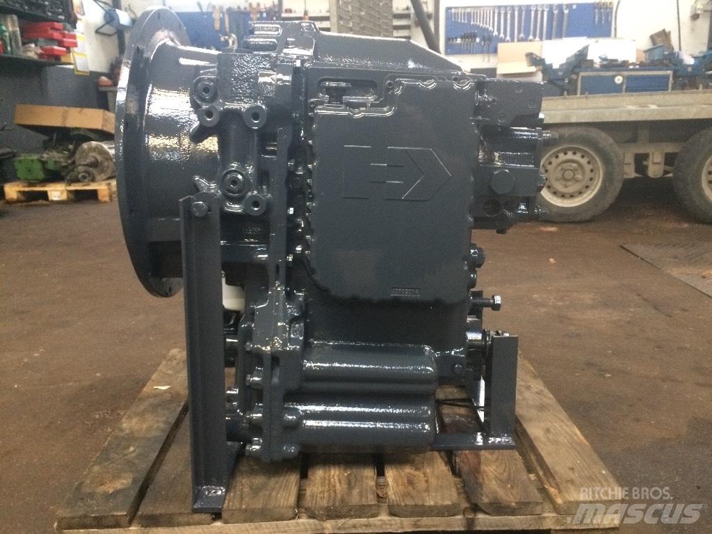New Holland LB 115 لوادر ذات جرافات عكسية