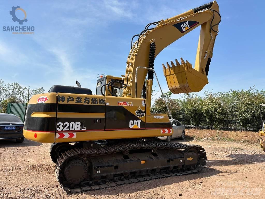 CAT 320 B L حفارات زحافة
