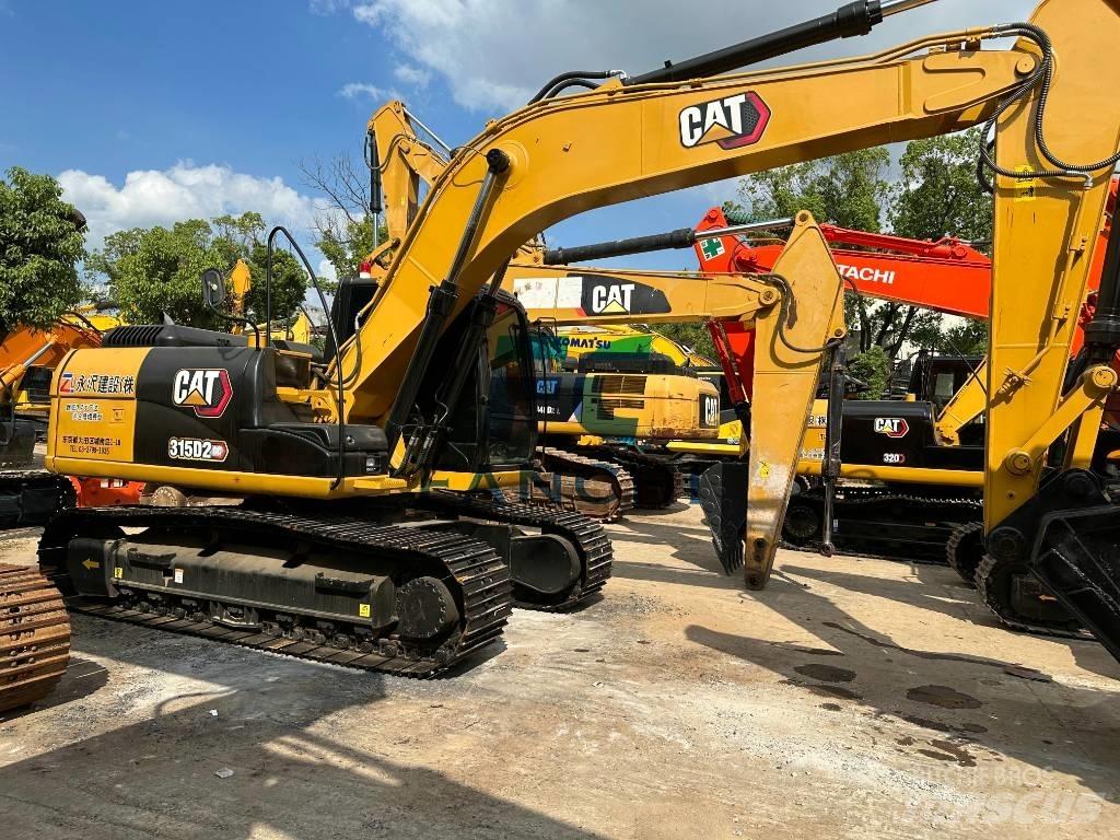 CAT 313 حفارات وسط 7 طن - 12 طن
