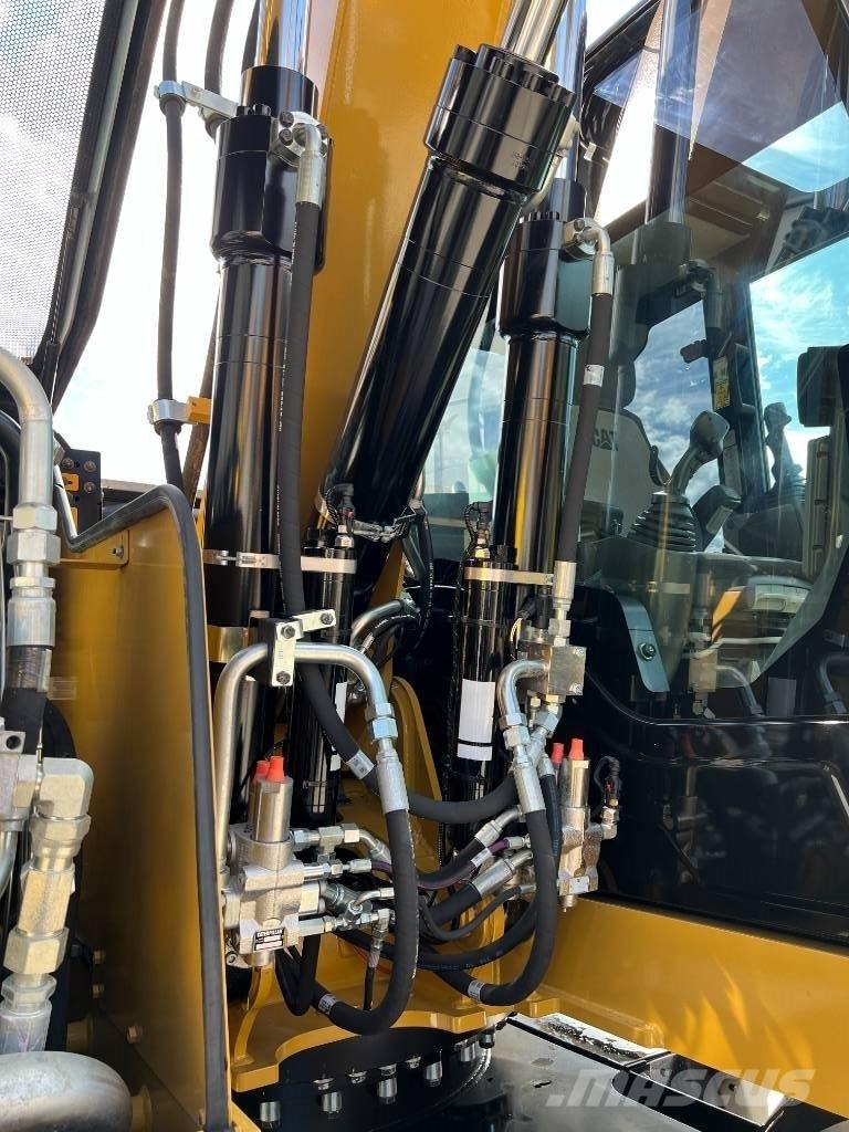 CAT M 315 F حفارات بعجل