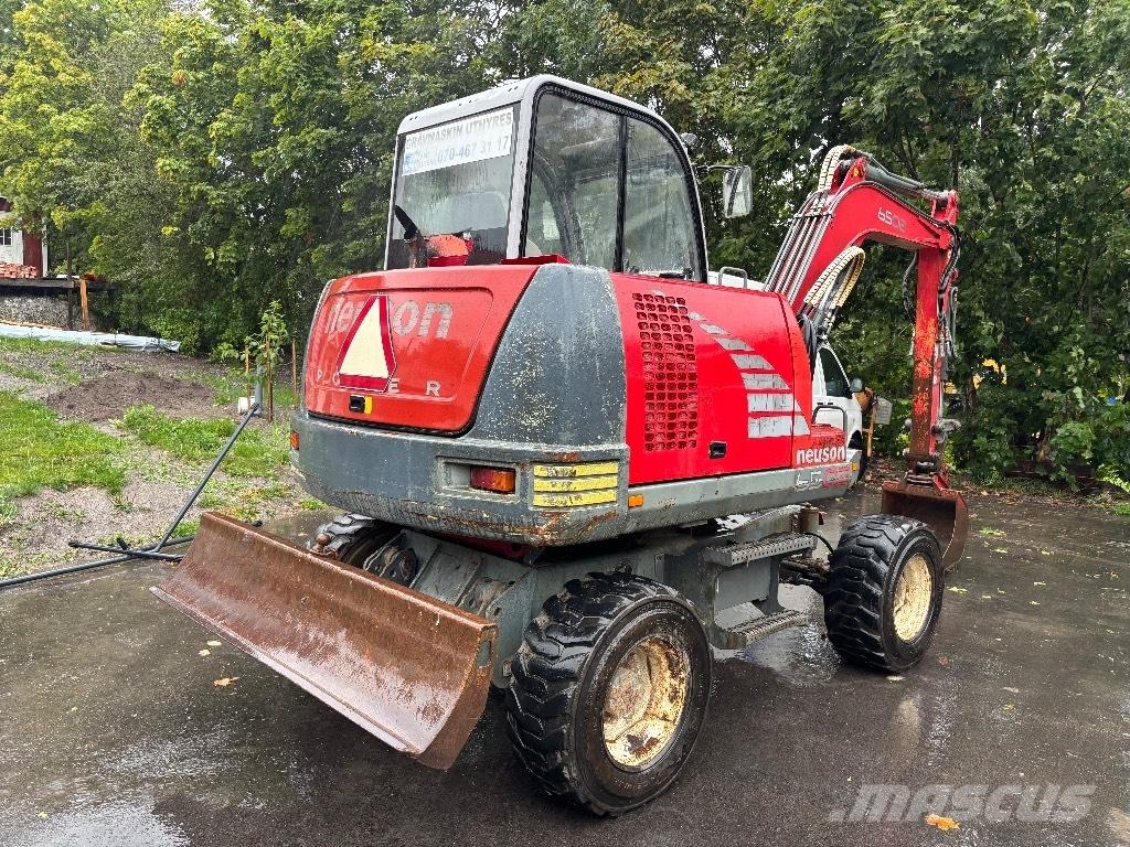 Neuson 6502 حفارات بعجل