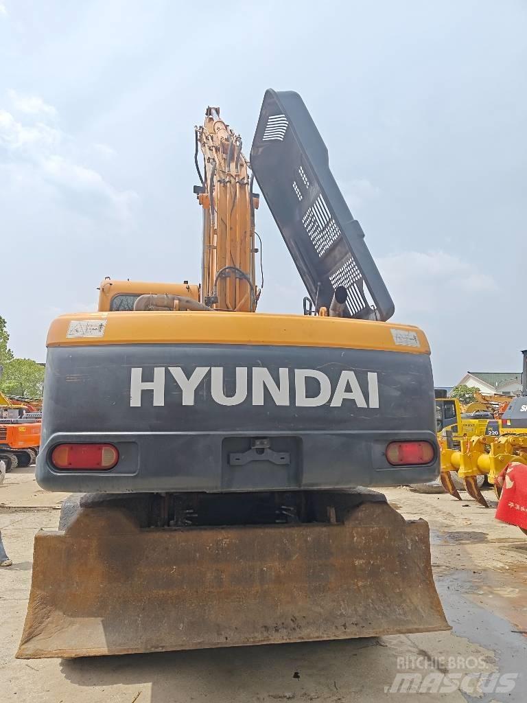 Hyundai R210W-9 حفارات بعجل