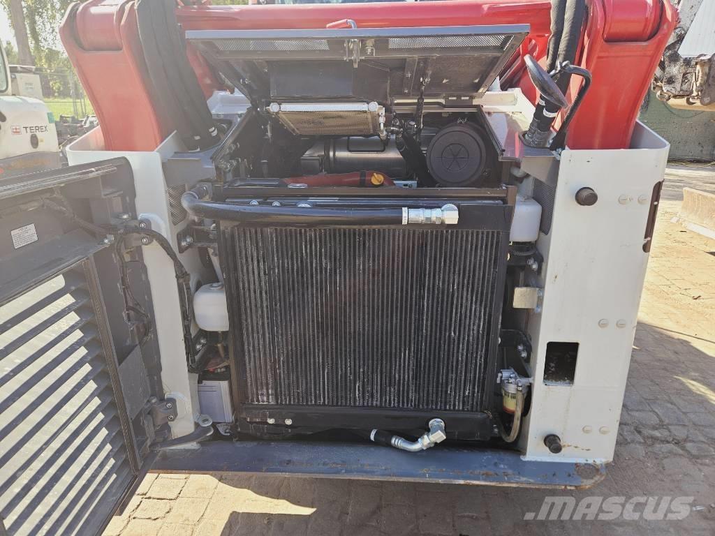 Takeuchi TL12 لوادر زحافة