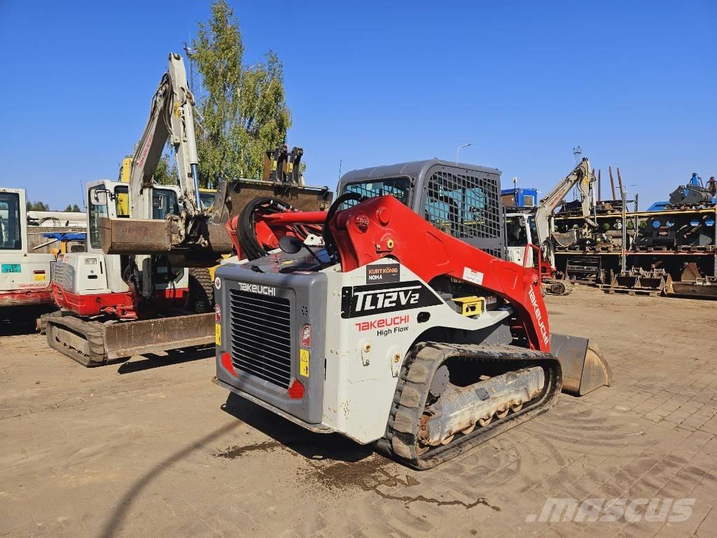 Takeuchi TL12 لوادر زحافة