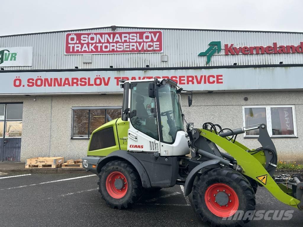 CLAAS Torion 537 لوادر وحفارات أمامية