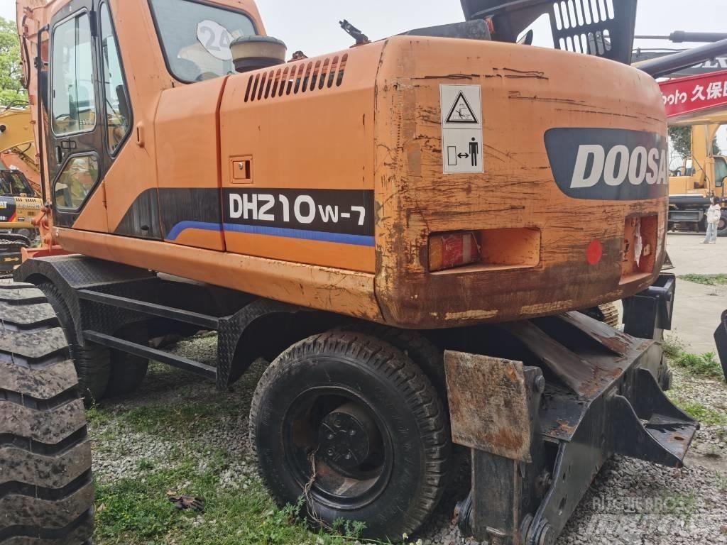 Doosan DH 210 W-7 حفارات بعجل