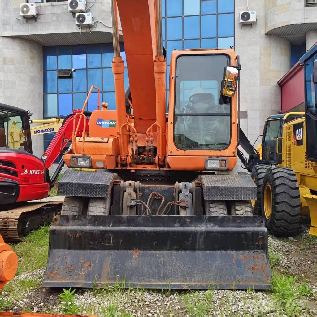 Doosan DH 210 W-7 حفارات بعجل