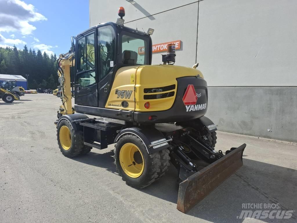 Yanmar B 95 W حفارات بعجل