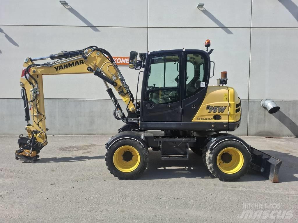 Yanmar B 95 W حفارات بعجل