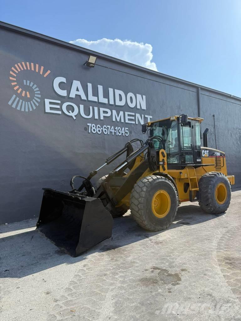 CAT IT 28 G لوادر بعجل