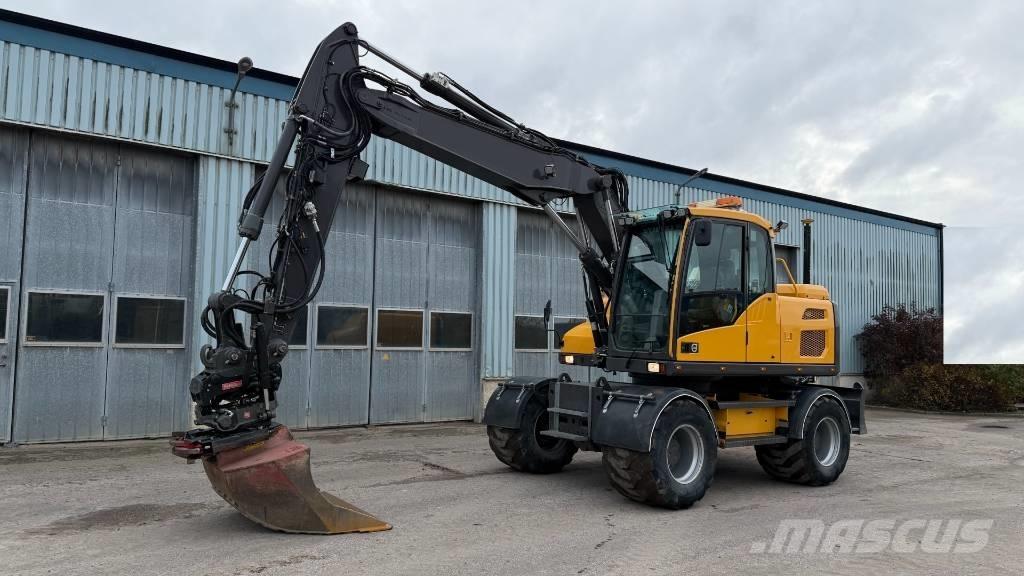 Volvo EW 140 D حفارات بعجل