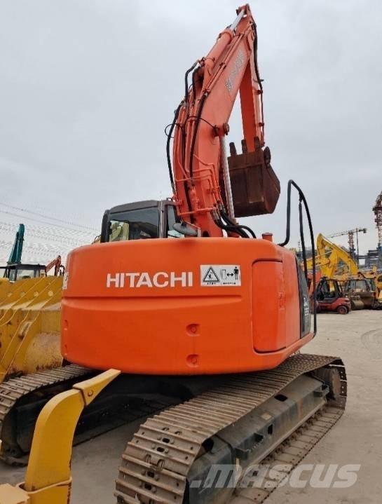 Hitachi ZX 135 US حفارات زحافة
