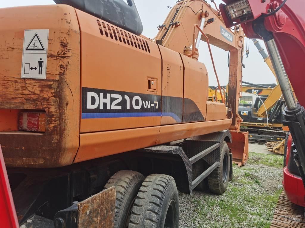 Doosan DH 210 W-7 حفارات بعجل