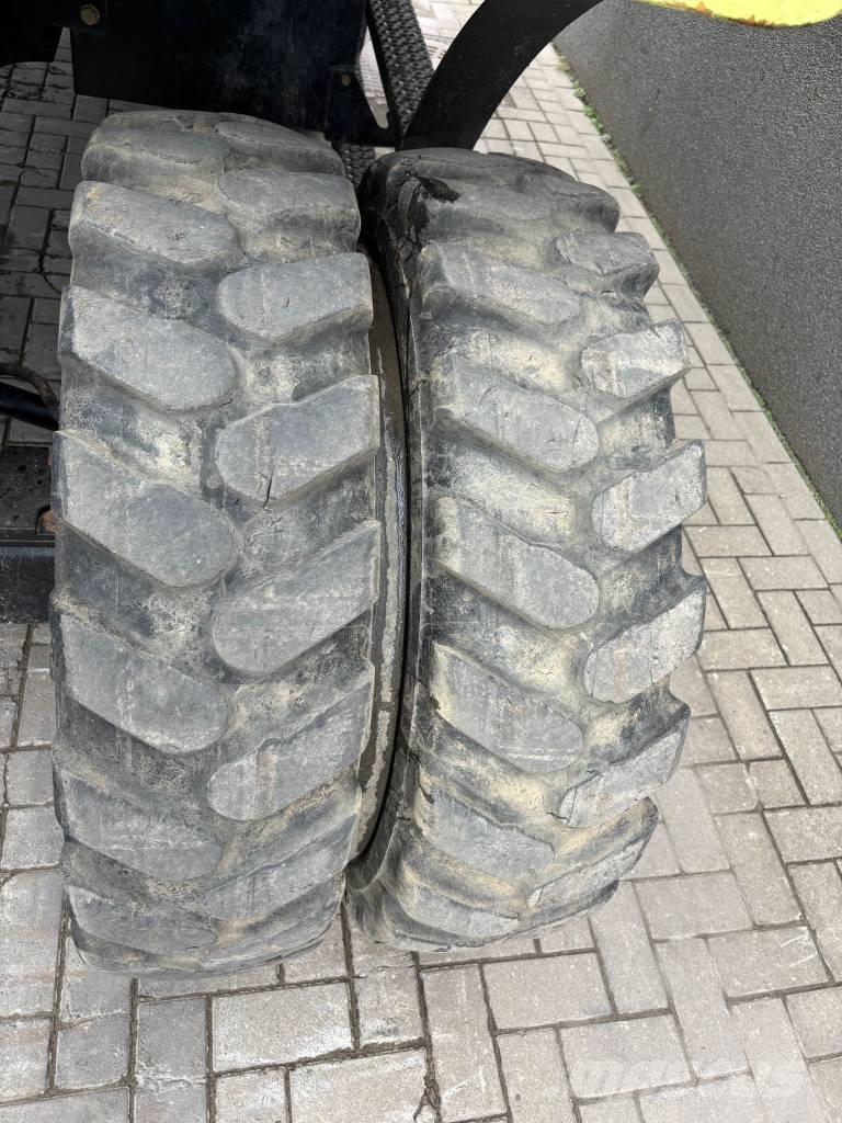 CAT M 320 F حفارات بعجل