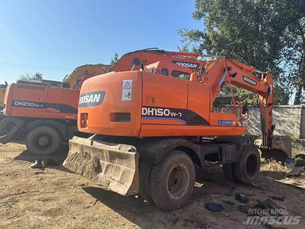 Doosan DH210W-7 حفارات بعجل