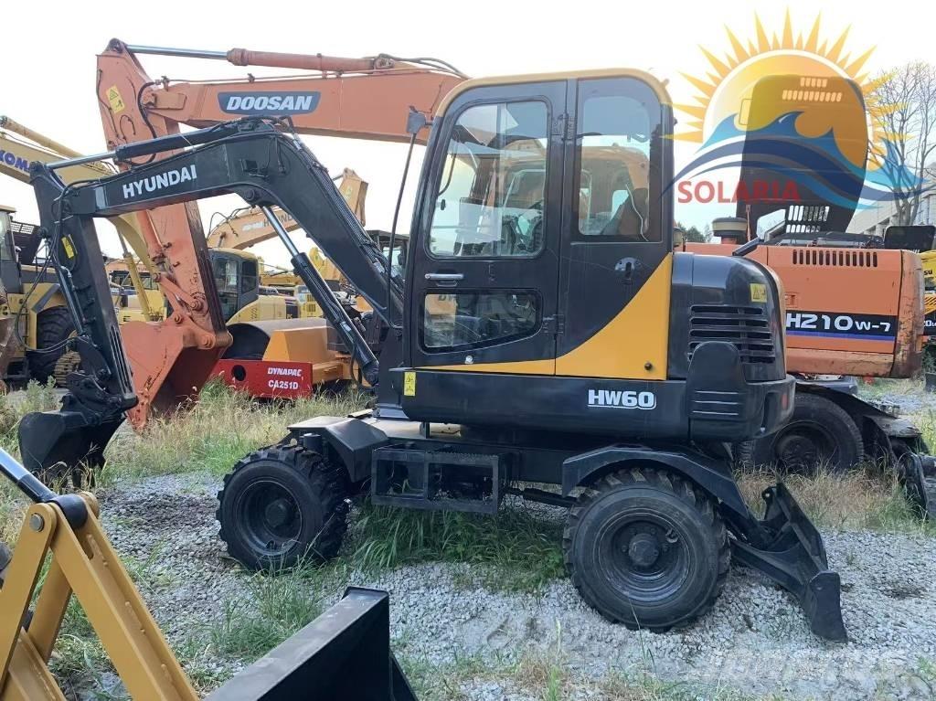Hyundai HW 60 حفارات بعجل