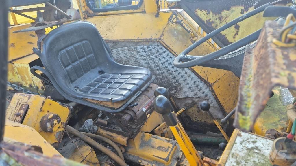Ford 4500 لوادر ذات جرافات عكسية