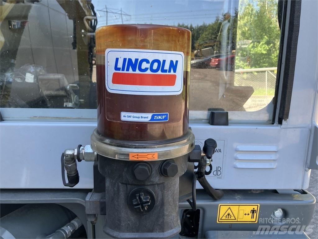 Wacker Neuson EW 100 حفارات بعجل
