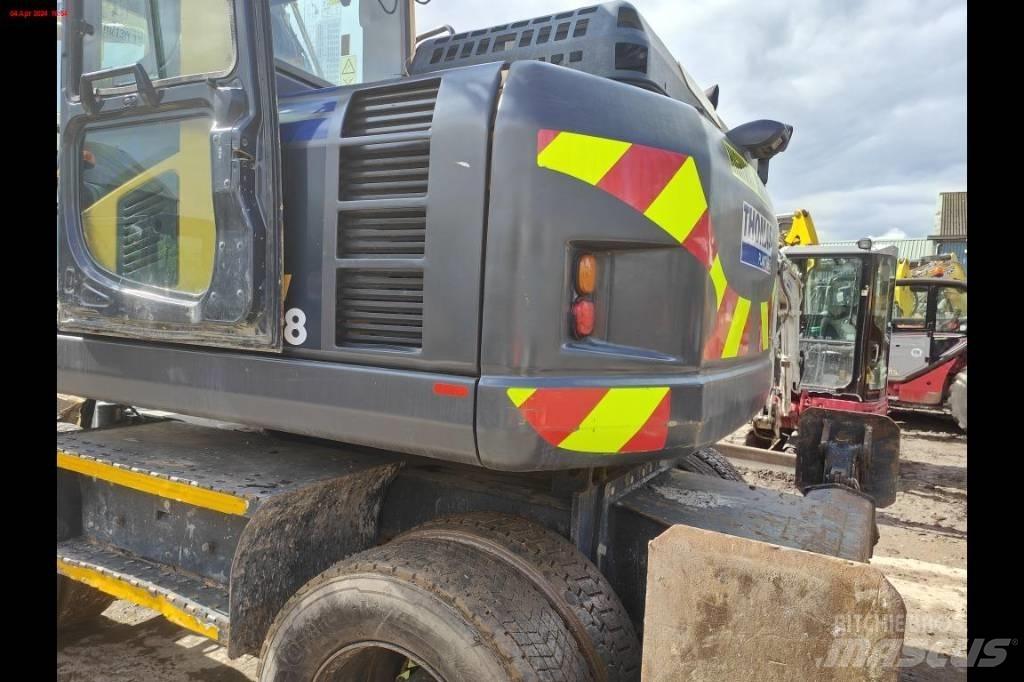 Komatsu PW 148-8 حفارات بعجل