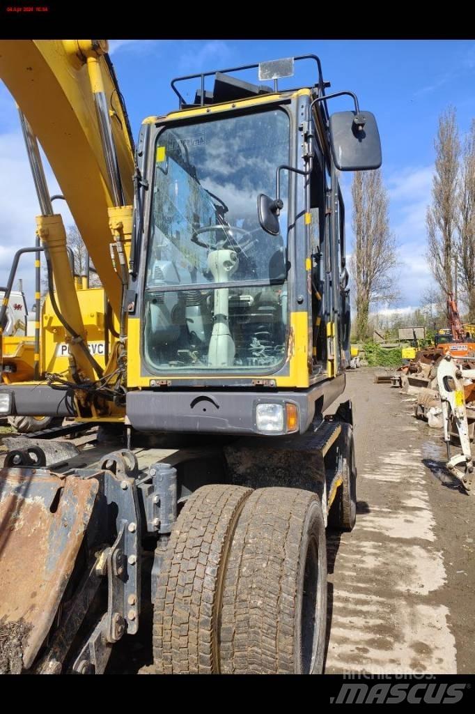 Komatsu PW 148-8 حفارات بعجل