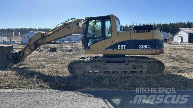 CAT 318 C حفارات زحافة