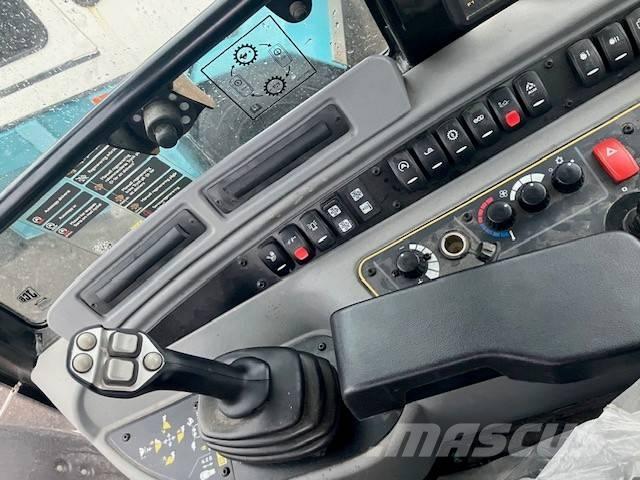 JCB 409 لوادر بعجل