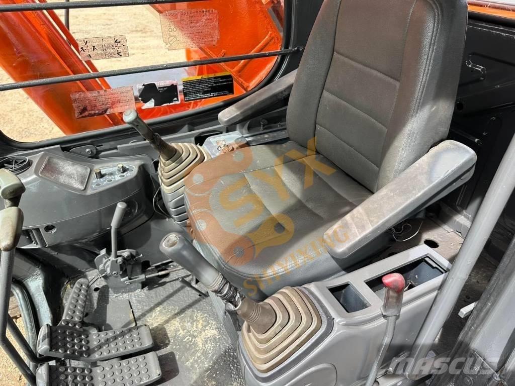 Hitachi EX 200-5 حفارات زحافة