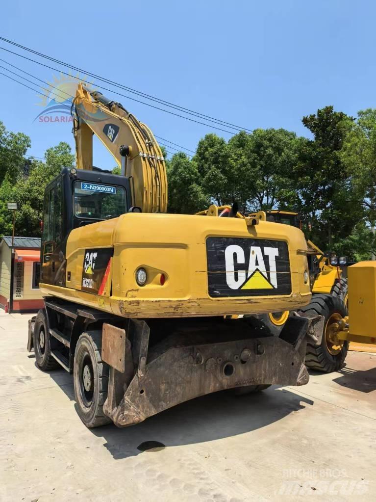 CAT M 315 D2 حفارات بعجل