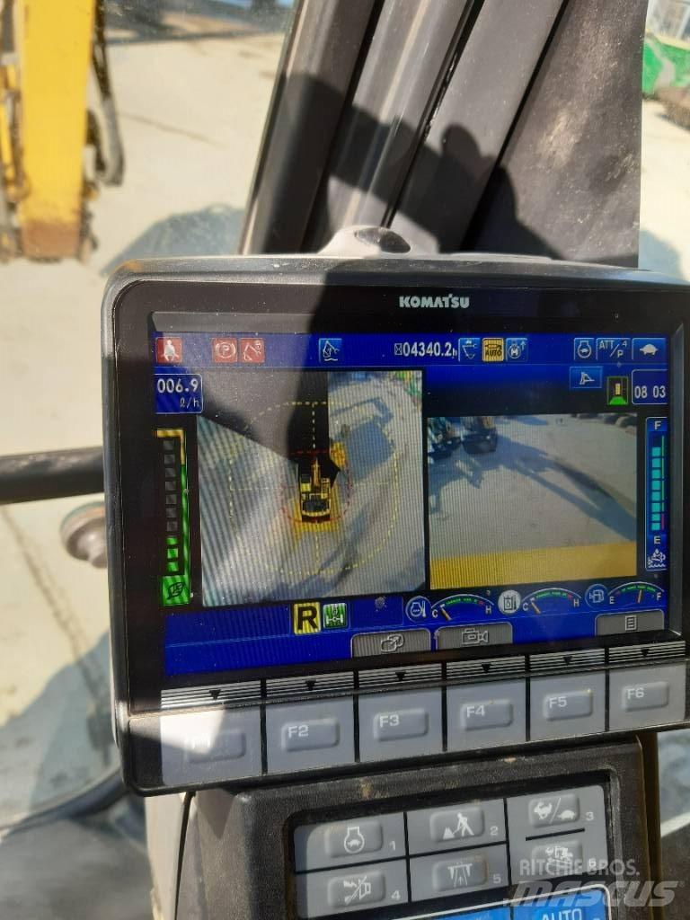 Komatsu PW180-11 حفارات بعجل