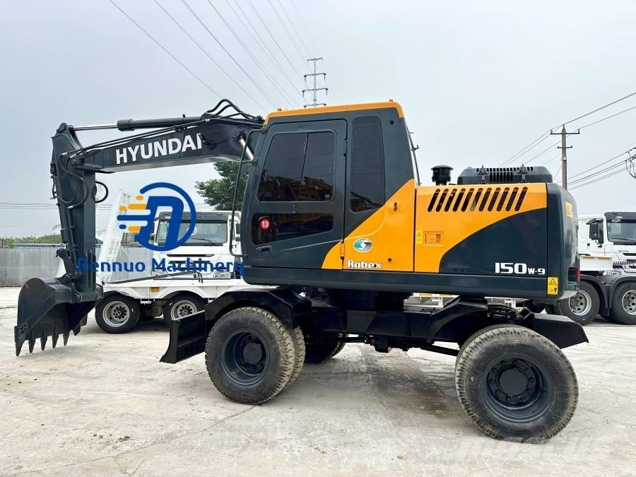Hyundai 150W-9 حفارات بعجل