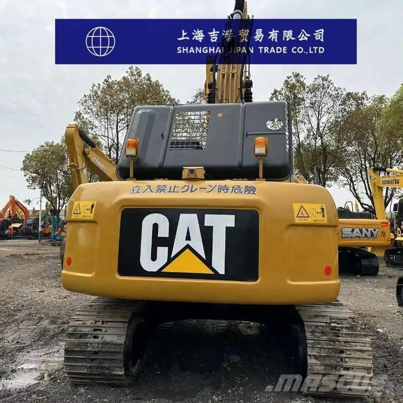 CAT 323 D حفارات زحافة