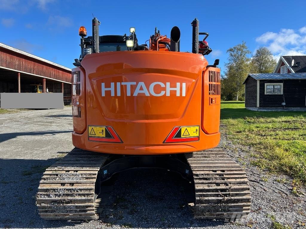 Hitachi ZX 135 US-7 حفارات زحافة