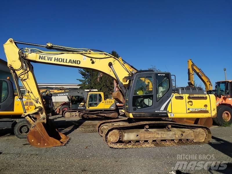 New Holland E 265 C حفارات زحافة