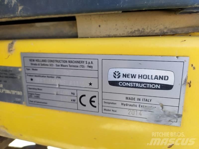 New Holland E 265 C حفارات زحافة