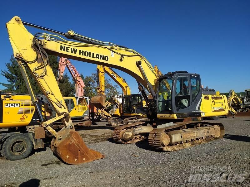 New Holland E 265 C حفارات زحافة