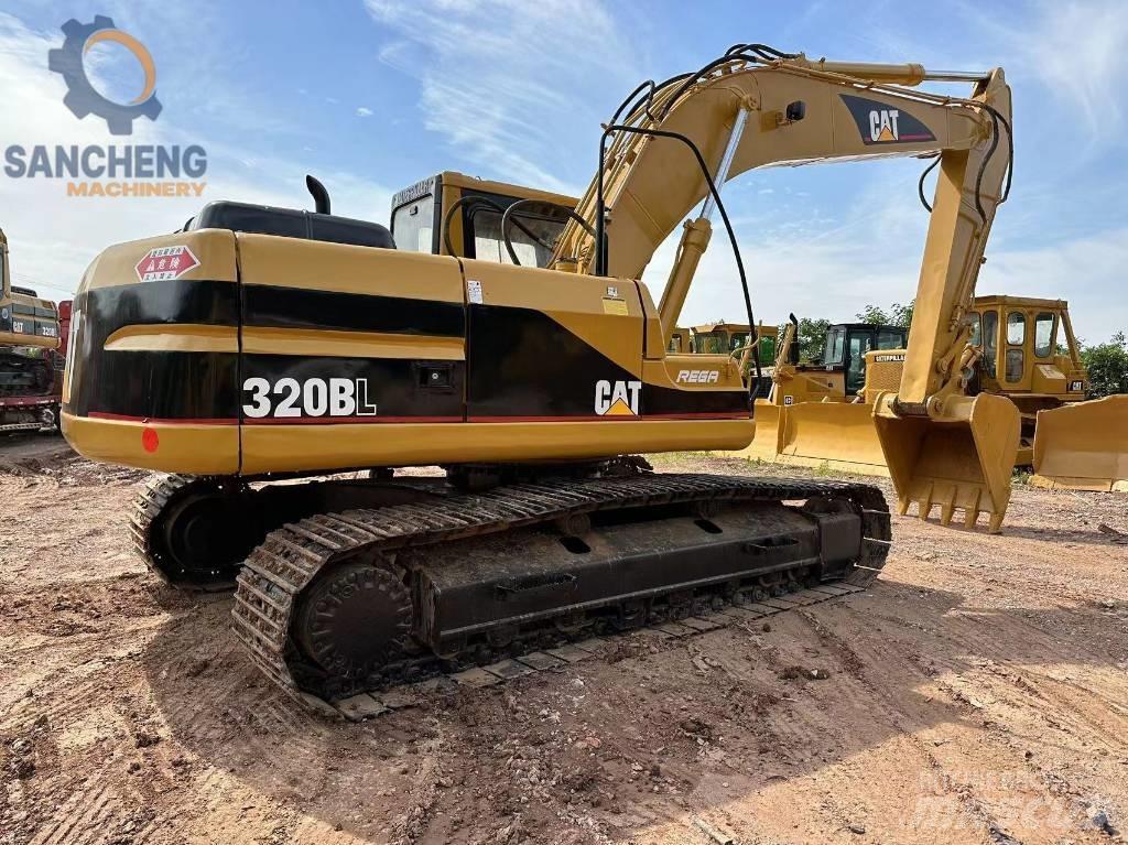 CAT 320 B L حفارات زحافة