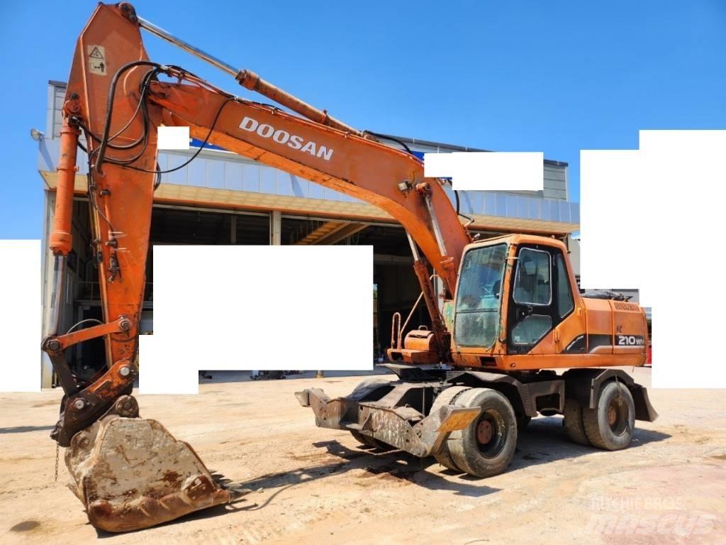 Daewoo Solar 210 W V حفارات بعجل