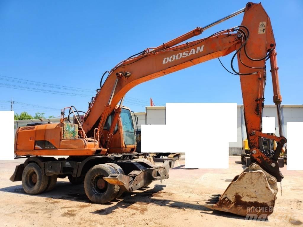 Daewoo Solar 210 W V حفارات بعجل