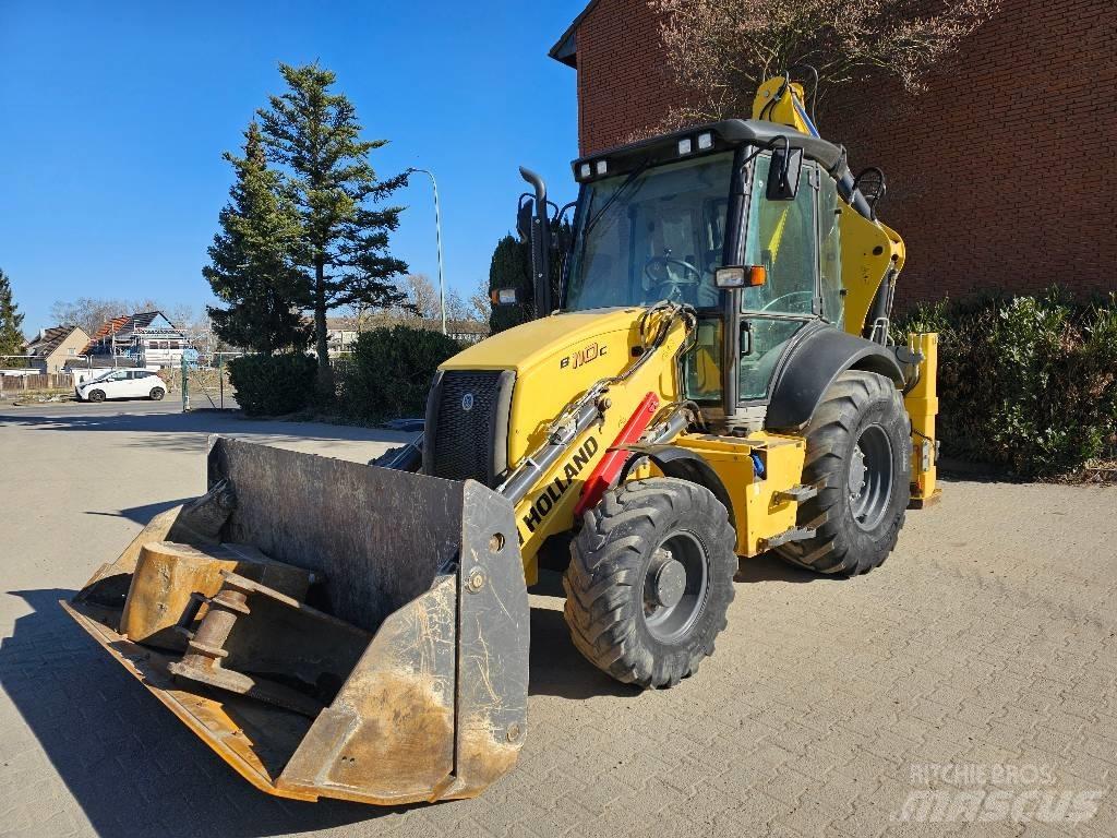 New Holland B 110 C لوادر ذات جرافات عكسية