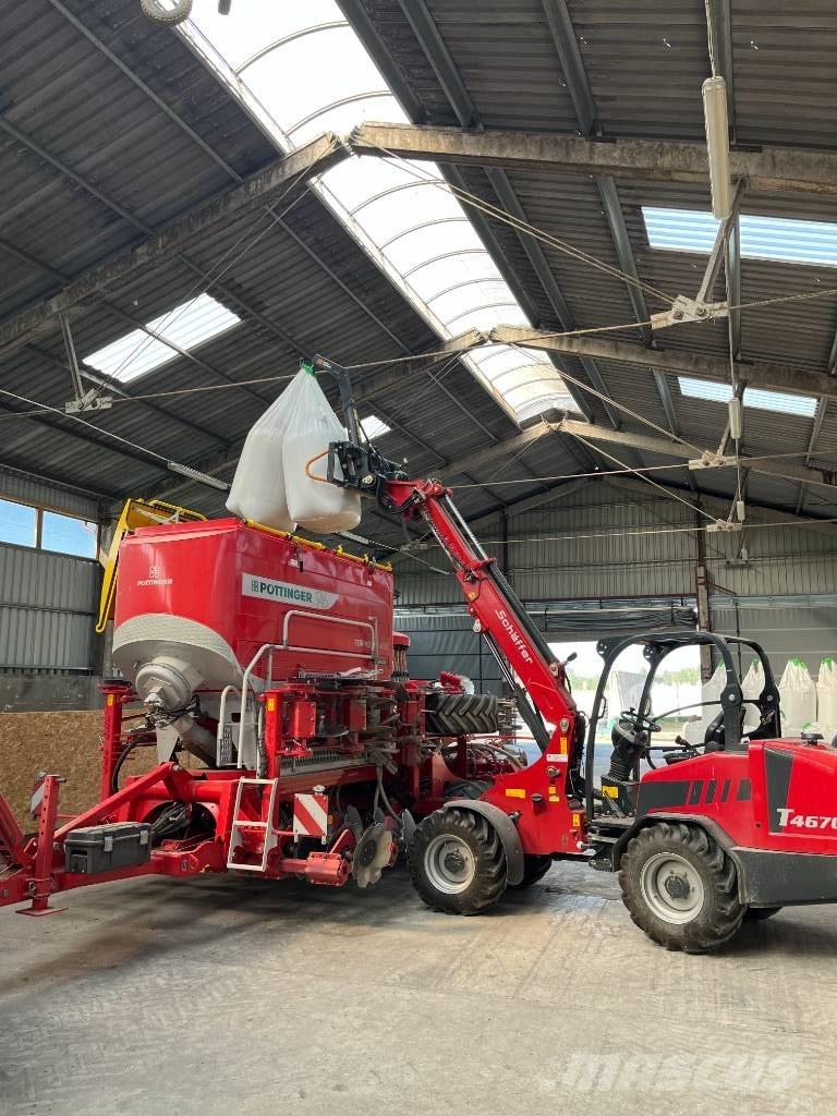 Schäffer T4670 لوادر وحفارات أمامية