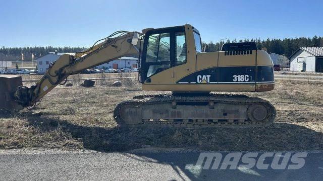 CAT 318 C حفارات زحافة