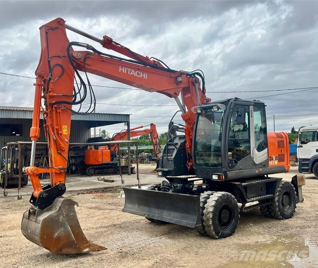 Hitachi ZX 145 W-3 حفارات بعجل