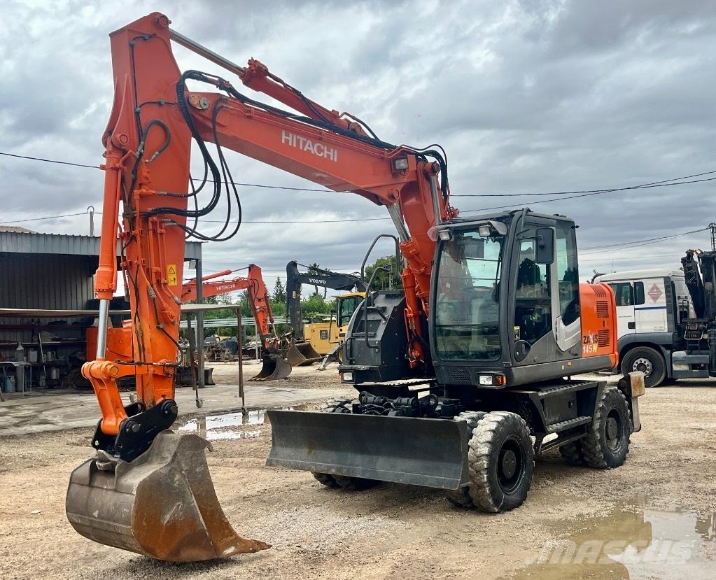 Hitachi ZX 145 W-3 حفارات بعجل