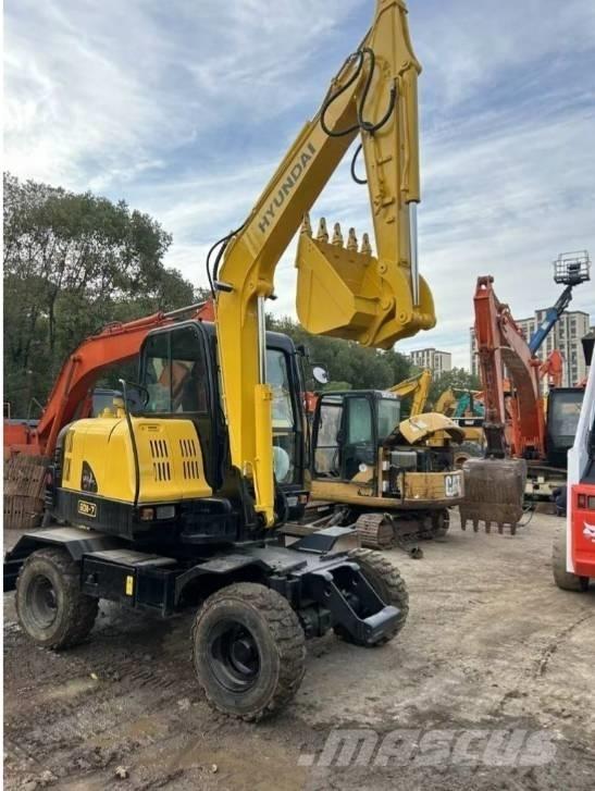 Hyundai 60W-7 حفارات بعجل