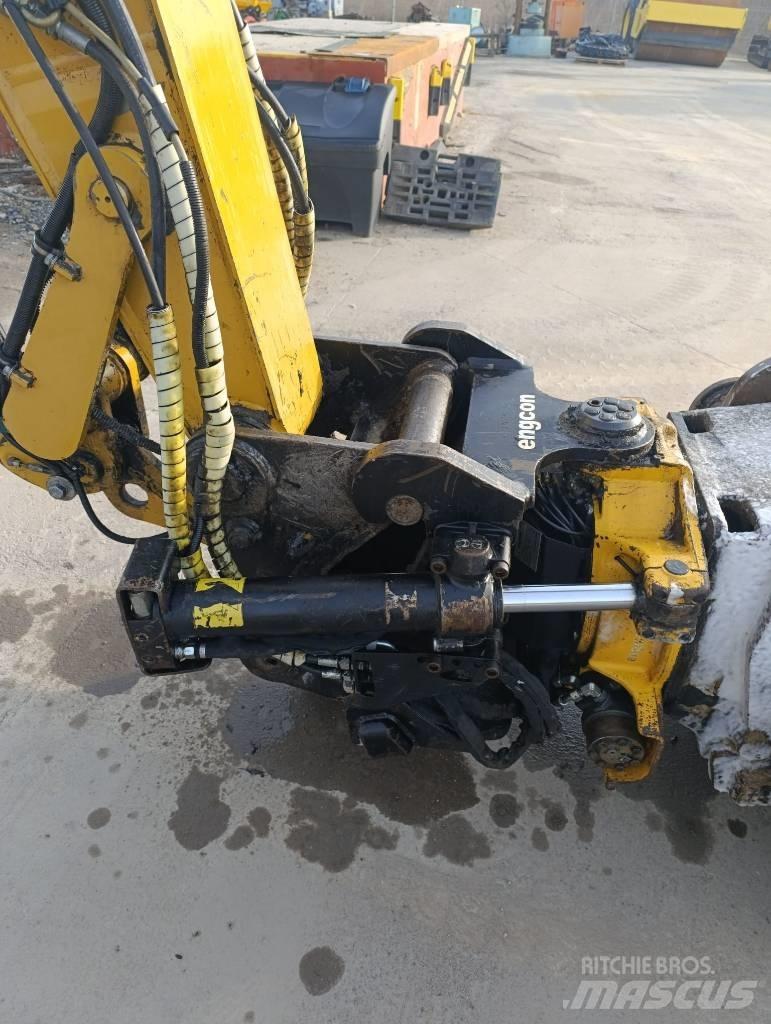 CAT M 313 D حفارات بعجل