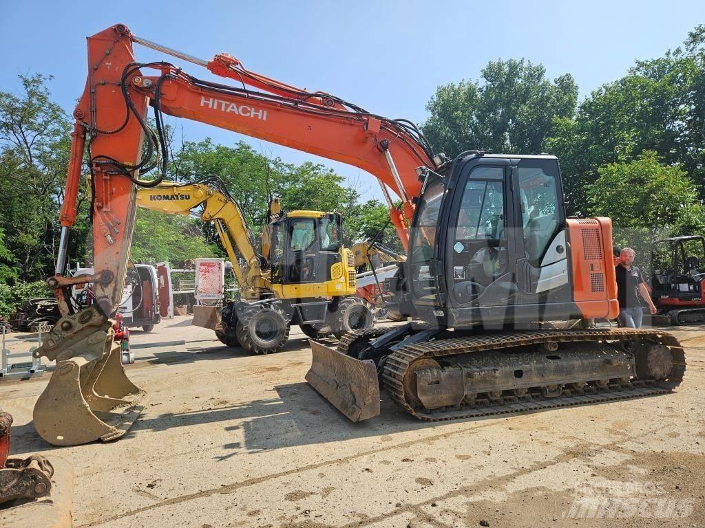 Hitachi ZX 135 US حفارات زحافة